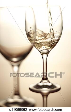 White Wine Being Poured Into Glass View Large Photo Image Stock Image - White Wine Being Poured Into Glass. Fotosearch