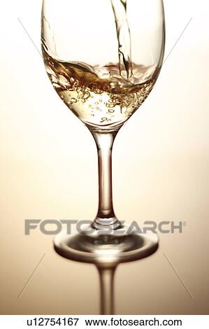 White Wine Being Poured Into Glass View Large Photo Image Stock Photo - White Wine Being Poured Into Glass. Fotosearch