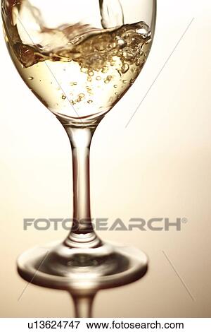 White Wine Being Poured Into Glass View Large Photo Image Stock Photo - White Wine Being Poured Into Glass. Fotosearch