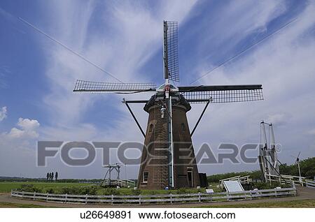 Stock Image - Windmill at Inba Pond, Chiba Prefecture, Honshu, Japan. Fotosearch