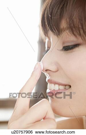 Young Woman Applying Face Cream View Large Photo Image Stock Photograph - Young Woman Applying Face Cream. Fotosearch