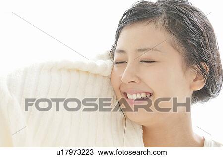 Young Woman Drying Face with Towel View Large Photo Image Stock Image - Young Woman Drying Face with Towel. Fotosearch