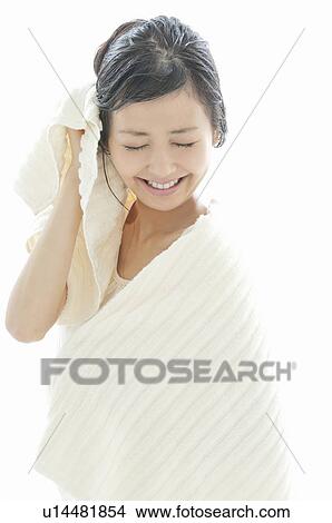 Picture - Young Woman Drying Herself. Fotosearch