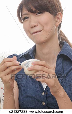 Young Woman Eating Dessert View Large Photo Image Stock Image - Young Woman Eating Dessert. Fotosearch