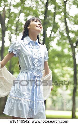 Young Woman Enjoying Nature View Large Photo Image Stock Image - Young Woman Enjoying Nature. Fotosearch