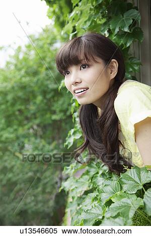 Young Woman Leaning Out From Window View Large Photo Image Stock Photography - Young Woman Leaning Out From Window. Fotosearch