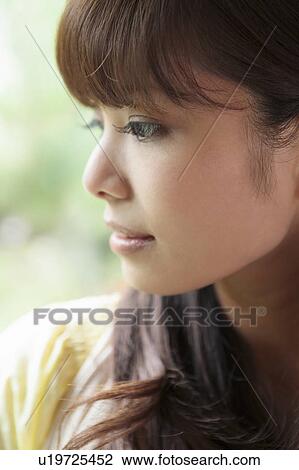 Young Woman Looking Down View Large Photo Image Stock Image - Young Woman Looking Down. Fotosearch