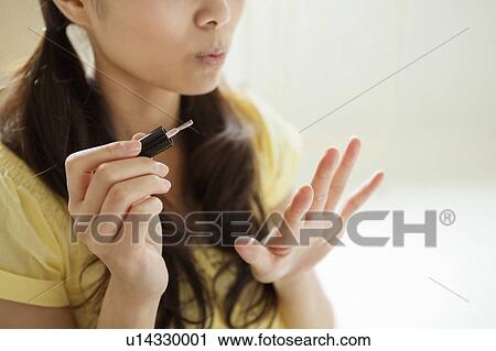 Young Woman Painting Nails View Large Photo Image Stock Image - Young Woman Painting Nails. Fotosearch