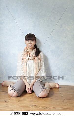 Young Woman Sitting on Floor View Large Photo Image Stock Image - Young Woman Sitting on Floor. Fotosearch