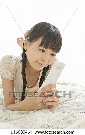 Young Woman Text Messaging View Large Photo Image Stock Image - Young Woman Text Messaging. Fotosearch