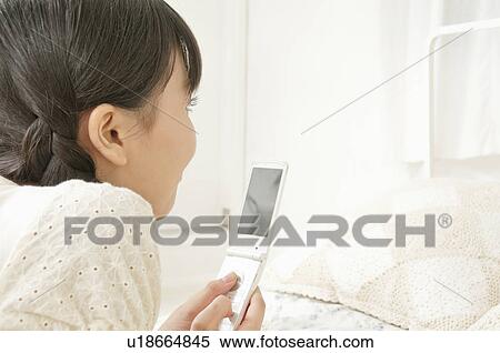 Young Woman Text Messaging View Large Photo Image Stock Photography - Young Woman Text Messaging. Fotosearch