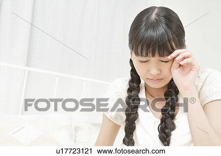 Stock Image - Young Woman Waking Up. Fotosearch
