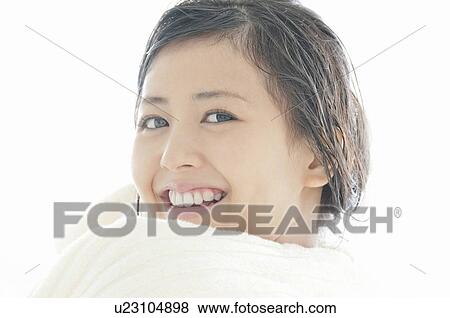 Stock Photo - Young Woman Wrapped in Towel. Fotosearch