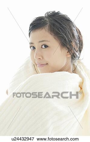 Stock Photo - Young Woman Wrapped in Towel. Fotosearch