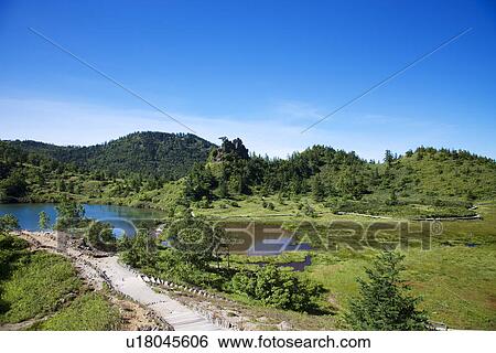 Stock Photograph - Yumiike and Mount Shirane. Fotosearch