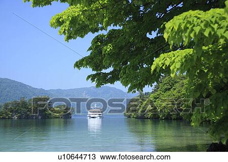 A boat on the Towada lake View Large Photo Image Stock Image - A boat on the Towada lake. Fotosearch
