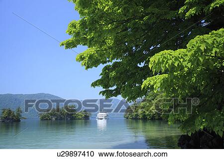 A boat on the Towada lake View Large Photo Image Stock Image - A boat on the Towada lake. Fotosearch