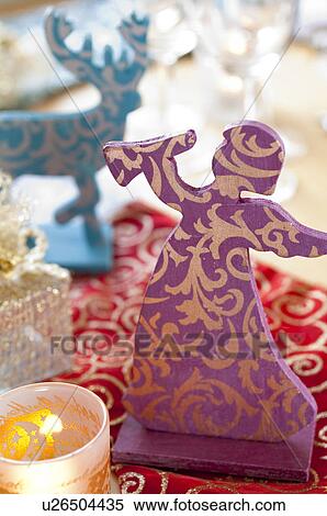 Stock Photography - Angel and reindeer figurine. Fotosearch