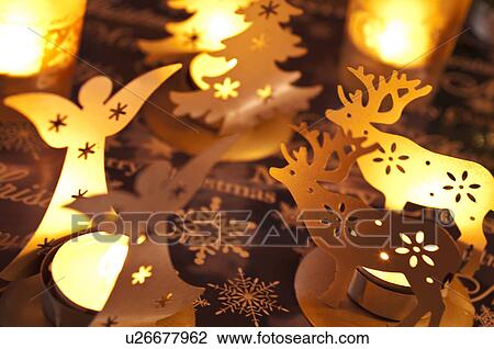 Angel, Christmas tree and reindeer candle holders View Large Photo Image Stock Image - Angel, Christmas tree and reindeer candle holders. Fotosearch