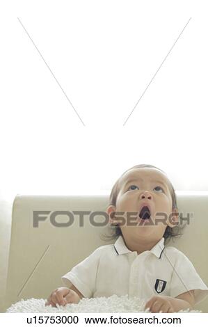 Baby girl yawning View Large Photo Image Stock Image - Baby girl yawning. Fotosearch