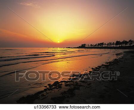Beach at Sunset View Large Photo Image Stock Image - Beach at Sunset. Fotosearch