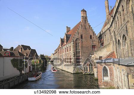 Stock Photo - Brick Buildings by Canal. Fotosearch