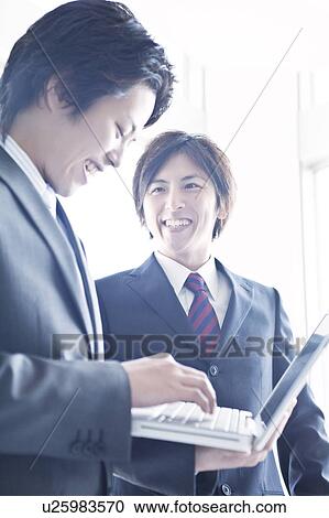 Business people having a meeting View Large Photo Image Stock Image - Business people having a meeting. Fotosearch