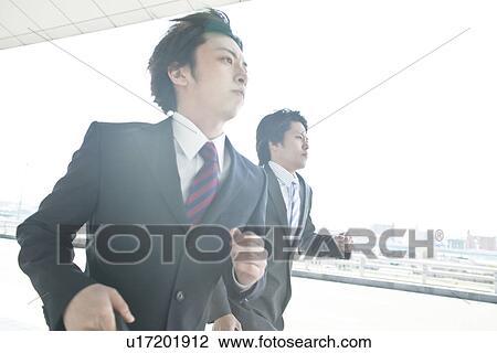 Business people running View Large Photo Image Stock Image - Business people running. Fotosearch