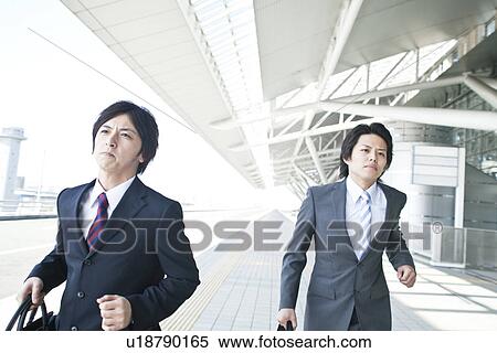 Business people running View Large Photo Image Stock Photography - Business people running. Fotosearch