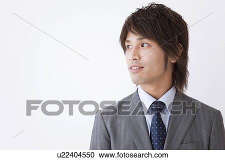 Businessman looking away View Large Photo Image Stock Image - Businessman looking away. Fotosearch