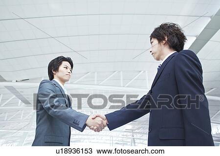 Businessmen shaking hands View Large Photo Image Stock Image - Businessmen shaking hands. Fotosearch