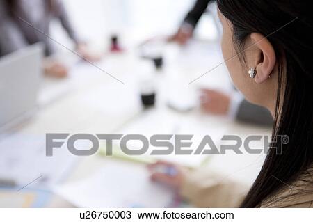 Businesspeople having a meeting View Large Photo Image Stock Image - Businesspeople having a meeting. Fotosearch