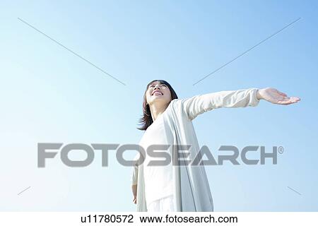 Stock Image - Carefree Young Woman. Fotosearch