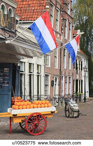 Cheese Cart and Dutch Flags Outside of Store View Large Photo Image Stock Photography - Cheese Cart and Dutch Flags Outside of Store. Fotosearch