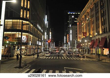 Stock Image - Chuo Street and Nihonbashi 2-chome at Night. Fotosearch