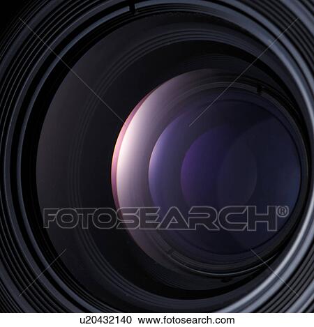 Stock Image - Close up of camera lens. Fotosearch