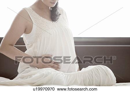 Close Up of Pregnant Woman View Large Photo Image Stock Image - Close Up of Pregnant Woman. Fotosearch