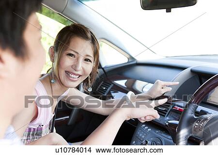 Couple Using GPS in Car View Large Photo Image Picture - Couple Using GPS in Car. Fotosearch