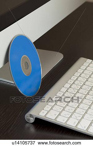 DVD and Computer Keyboard View Large Photo Image Stock Photo - DVD and Computer Keyboard. Fotosearch