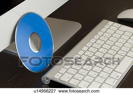 Stock Photo - DVD and Computer Keyboard. Fotosearch