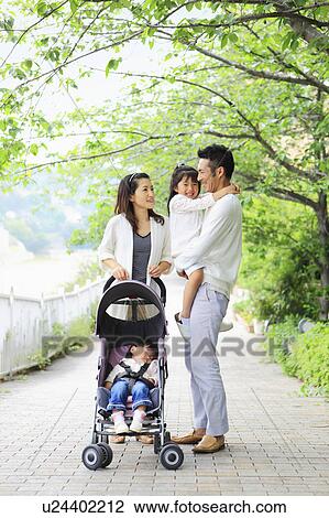 Family of Four in Park View Large Photo Image Stock Image - Family of Four in Park. Fotosearch