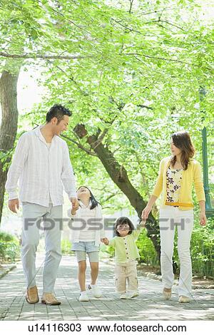 Family of Four Walking in Park View Large Photo Image Stock Image - Family of Four Walking in Park. Fotosearch