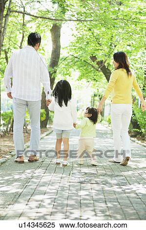 Family of Four Walking in Park View Large Photo Image Stock Photography - Family of Four Walking in Park. Fotosearch