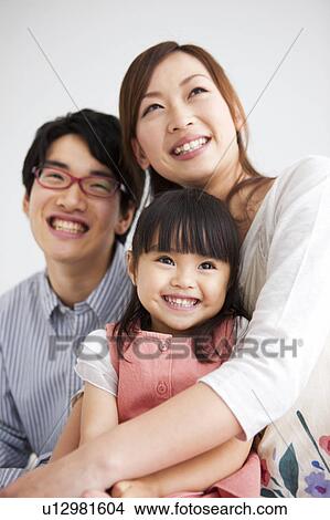 Family smiling View Large Photo Image Picture - Family smiling. Fotosearch