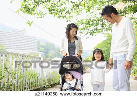 Family with Two Daughters in Park View Large Photo Image Stock Photo - Family with Two Daughters in Park. Fotosearch
