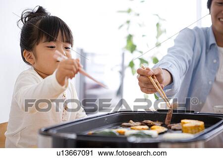 Father and Daughter Having Teppanyaki View Large Photo Image Stock Image - Father and Daughter Having Teppanyaki. Fotosearch