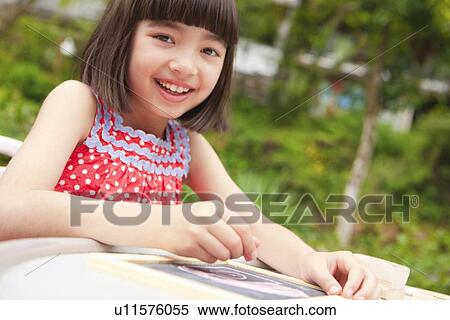 Girl Drawing on Blackboard View Large Photo Image Stock Photography - Girl Drawing on Blackboard. Fotosearch