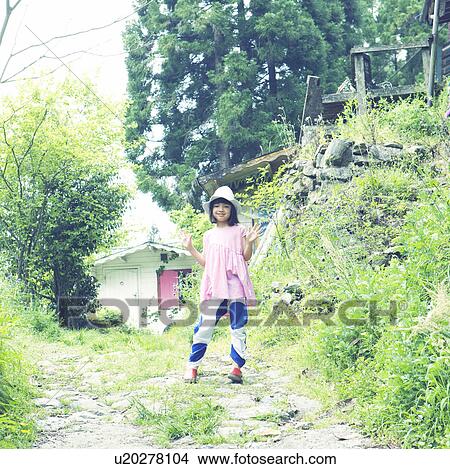 Girl Wearing Hat and Raising Hands View Large Photo Image Picture - Girl Wearing Hat and Raising Hands. Fotosearch