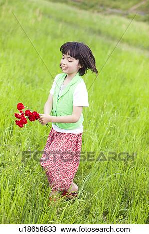 Girl with Bunch of Flowers in Field View Large Photo Image Stock Image - Girl with Bunch of Flowers in Field. Fotosearch