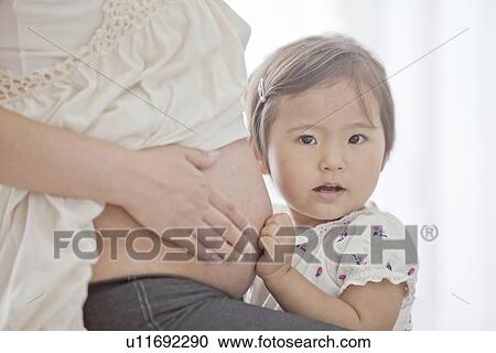 Girl with Her Pregnant Mother View Large Photo Image Stock Image - Girl with Her Pregnant Mother. Fotosearch